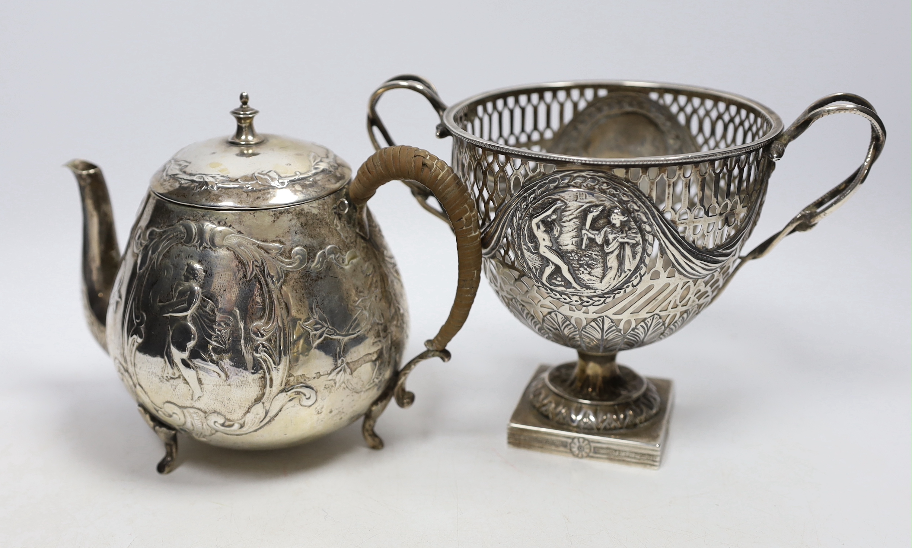 A late Victorian pierced silver neo-classical design sugar bowl, Chester 1900, 261 grams, and a 19th century Dutch silver teapot, decorated with classical figures and scrolls, gross 392 grams